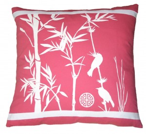 Pink Bird Tropical Pillow on branch with leaves Pink Bird Tropical Pillow on branch with leaves