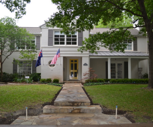 White and Grey Painted Brick Yellow Front Door